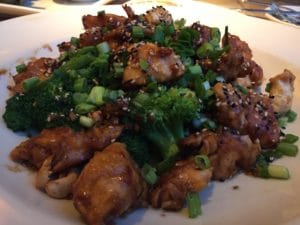 cheesecake factory's spicy cashew chicken plate with broccoli smart choice