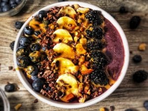 blueberry acai cacao protein smoothie bowl