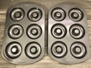 2 6-cavity donut pans